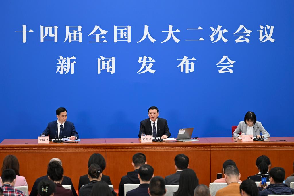3月4日，十四屆全國人大二次會議在北京人民大會堂舉行新聞發(fā)布會。大會發(fā)言人婁勤儉就大會議程和人大工作相關(guān)問題回答中外記者的提問。 新華社記者 牟宇 攝
