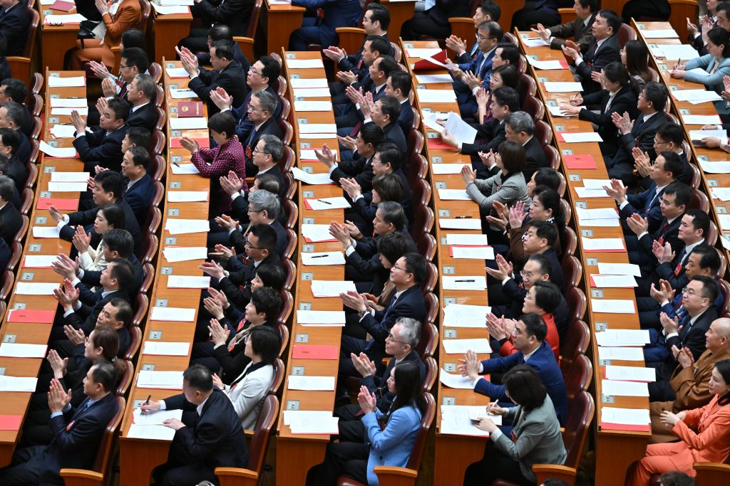 3月11日，第十四屆全國人民代表大會第二次會議在北京人民大會堂舉行閉幕會。新華社記者 李鑫 攝